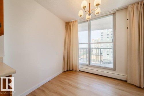 Patio Doors to balcony. - 1101 12141 Jasper Avenue, Edmonton, AB - Indoor Photo Showing Other Room
