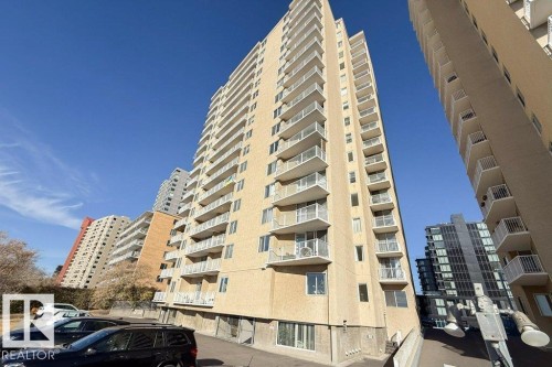 Lots of VISITOR parking at rear of building - 1101 12141 Jasper Avenue, Edmonton, AB - Outdoor With Balcony With Facade