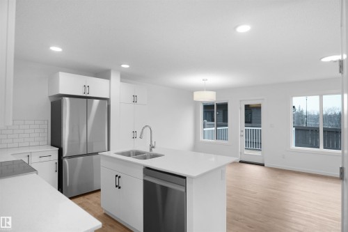 59 19904 31 Avenue, Edmonton, AB - Indoor Photo Showing Kitchen With Double Sink With Upgraded Kitchen