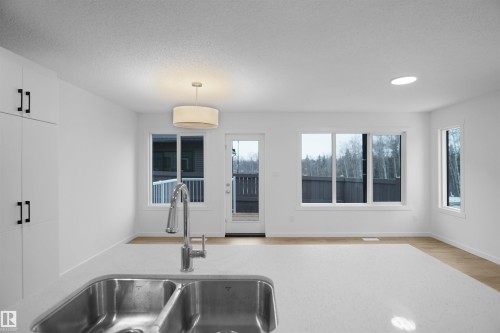 59 19904 31 Avenue, Edmonton, AB - Indoor Photo Showing Kitchen With Double Sink