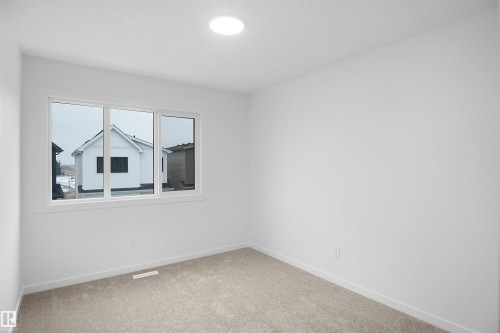59 19904 31 Avenue, Edmonton, AB - Indoor Photo Showing Other Room