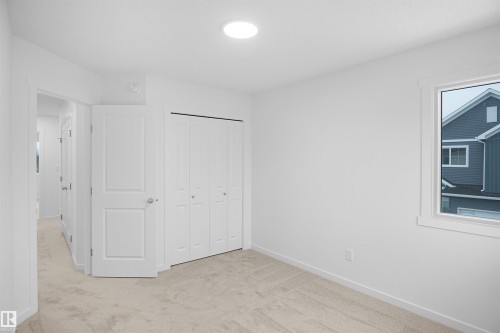 59 19904 31 Avenue, Edmonton, AB - Indoor Photo Showing Other Room