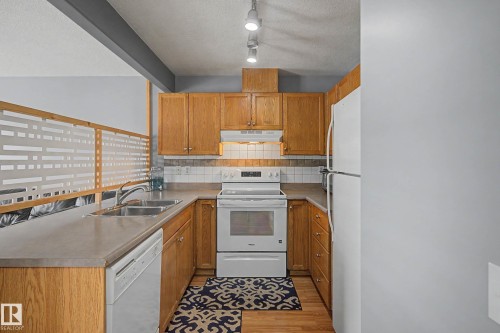 79 16823 84 Street, Edmonton, AB - Indoor Photo Showing Kitchen With Double Sink