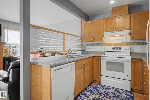 79 16823 84 Street, Edmonton, AB - Indoor Photo Showing Kitchen With Double Sink