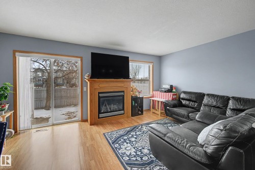 79 16823 84 Street, Edmonton, AB - Indoor Photo Showing Living Room With Fireplace