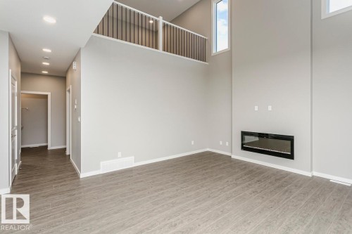 332 173 Avenue, Edmonton, AB - Indoor Photo Showing Other Room With Fireplace