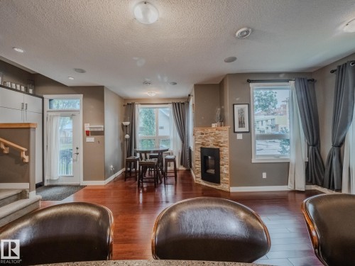 8306 108 Street, Edmonton, AB - Indoor Photo Showing Living Room With Fireplace