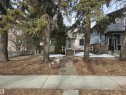 The property features a front yard with mature trees and a paved walkway leading to the front entrance - 8146 78 Avenue Nw, Edmonton, AB  - Outdoor 