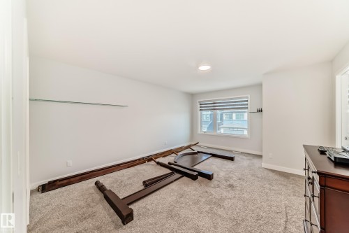 4005 Hawthorn Link Link, Edmonton, AB - Indoor Photo Showing Gym Room
