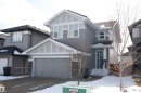 This property features a gray exterior with white trim, a double garage, and a front entry with a small porch - 20503 99 Avenue, Edmonton, AB  - Outdoor With Facade 
