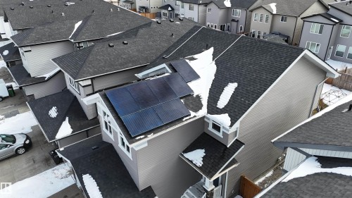 The property features solar panels installed on the roof, contributing to energy efficiency - 20503 99 Avenue, Edmonton, AB - Outdoor