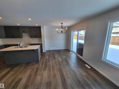 1184 South Creek Wynd, Stony Plain, AB - Indoor Photo Showing Kitchen With Double Sink