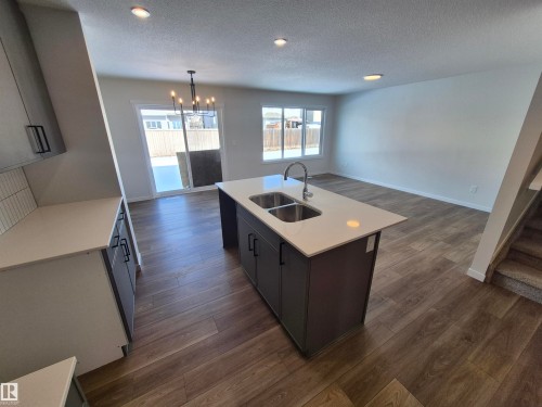 1184 South Creek Wynd, Stony Plain, AB - Indoor Photo Showing Kitchen With Double Sink