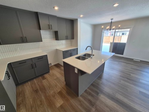 1184 South Creek Wynd, Stony Plain, AB - Indoor Photo Showing Kitchen With Double Sink
