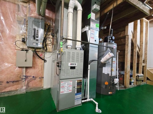 The property includes a water heater, a furnace, and an electrical panel - 60 1128 156 Street, Edmonton, AB - Indoor Photo Showing Basement