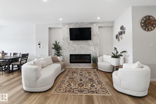 10 Prospect Place, Spruce Grove, AB - Indoor Photo Showing Living Room With Fireplace
