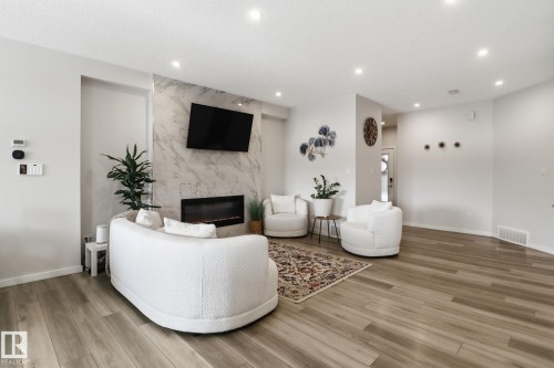 10 Prospect Place, Spruce Grove, AB - Indoor Photo Showing Living Room With Fireplace