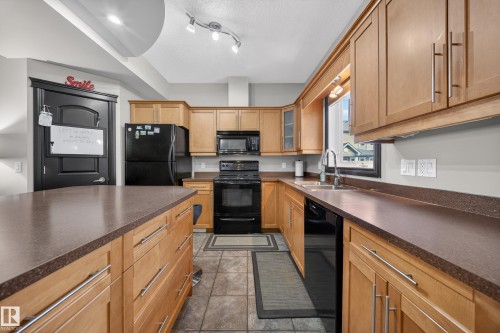 43 903 Rutherford Road, Edmonton, AB - Indoor Photo Showing Kitchen With Double Sink