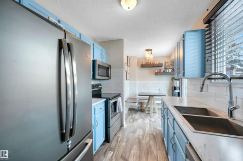 34 Walden Crescent, St. Albert, AB - Indoor Photo Showing Kitchen With Double Sink