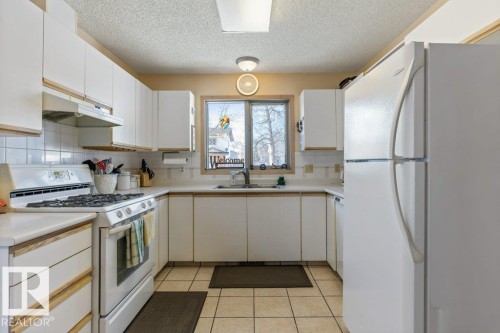 53 Dayton Crescent, St. Albert, AB - Indoor Photo Showing Kitchen With Double Sink