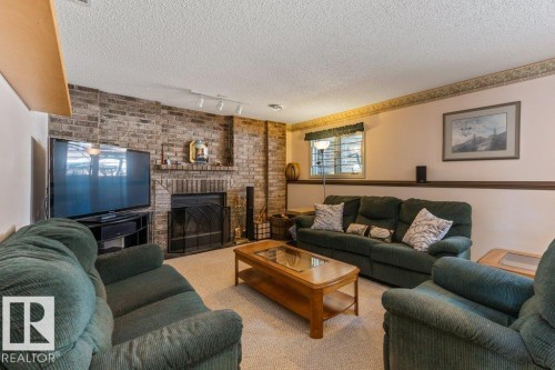53 Dayton Crescent, St. Albert, AB - Indoor Photo Showing Living Room With Fireplace