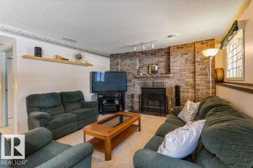 53 Dayton Crescent, St. Albert, AB - Indoor Photo Showing Living Room With Fireplace