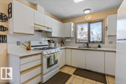 53 Dayton Crescent, St. Albert, AB - Indoor Photo Showing Kitchen With Double Sink