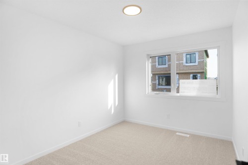 21 1430 Aster Way, Edmonton, AB - Indoor Photo Showing Other Room