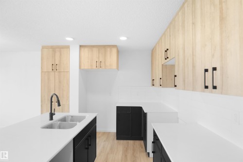 21 1430 Aster Way, Edmonton, AB - Indoor Photo Showing Kitchen With Double Sink