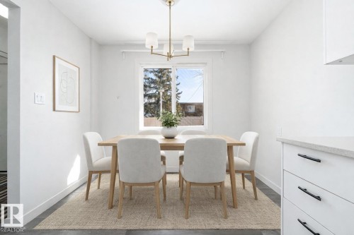 This image has been virtually staged - 129 Londonderry Square, Edmonton, AB - Indoor Photo Showing Dining Room