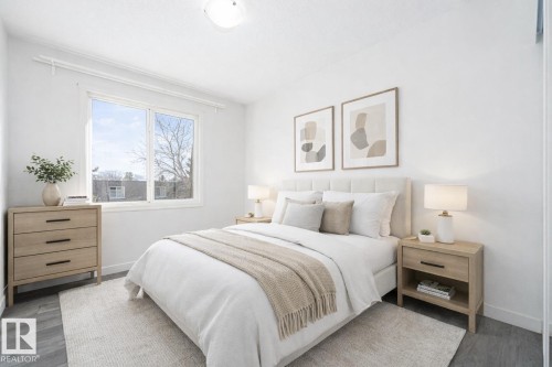 This image has been virtually staged - 129 Londonderry Square, Edmonton, AB - Indoor Photo Showing Bedroom