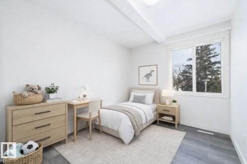 This image has been virtually staged - 129 Londonderry Square, Edmonton, AB - Indoor Photo Showing Bedroom
