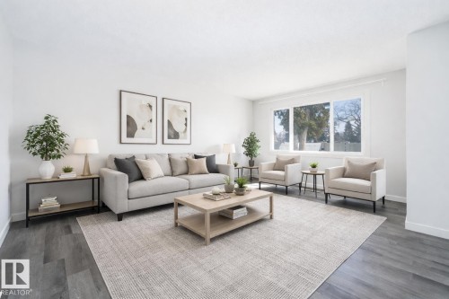 This image has been virtually staged - 129 Londonderry Square, Edmonton, AB - Indoor Photo Showing Living Room
