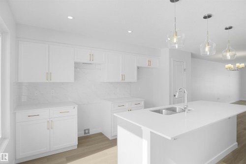 7351 181 Avenue, Edmonton, AB - Indoor Photo Showing Kitchen With Double Sink