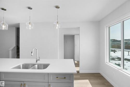 7351 181 Avenue, Edmonton, AB - Indoor Photo Showing Kitchen With Double Sink