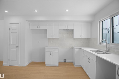 5133 River'S Edge Way, Edmonton, AB - Indoor Photo Showing Kitchen With Double Sink