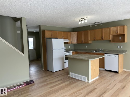 112 4350 23 Street, Edmonton, AB - Indoor Photo Showing Kitchen With Double Sink