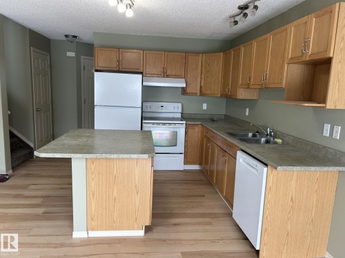 112 4350 23 Street, Edmonton, AB - Indoor Photo Showing Kitchen With Double Sink