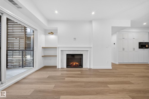 301 7459 May Common, Edmonton, AB - Indoor With Fireplace
