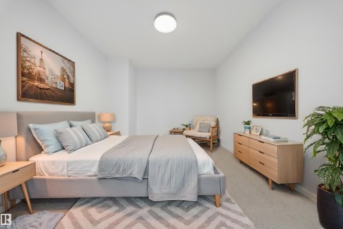 Virtually Staged - 301 7459 May Common, Edmonton, AB - Indoor Photo Showing Bedroom