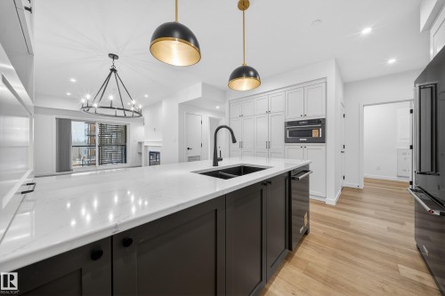 301 7459 May Common, Edmonton, AB - Indoor Photo Showing Kitchen With Double Sink With Upgraded Kitchen