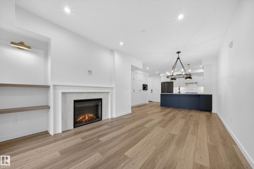 301 7459 May Common, Edmonton, AB - Indoor With Fireplace