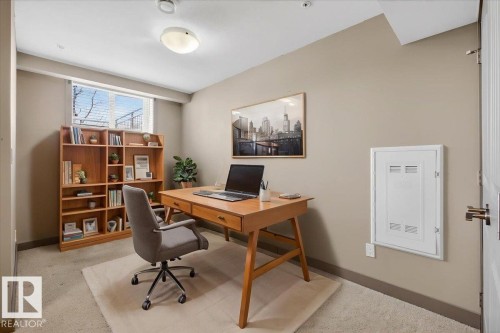 This room features a window with blinds, light-colored walls, and carpeting - 2105 Casselman Link Link, Edmonton, AB - Indoor Photo Showing Office