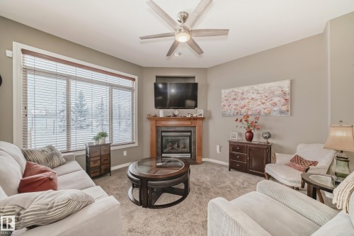 104 Westerra Boulevard, Stony Plain, AB - Indoor Photo Showing Living Room With Fireplace