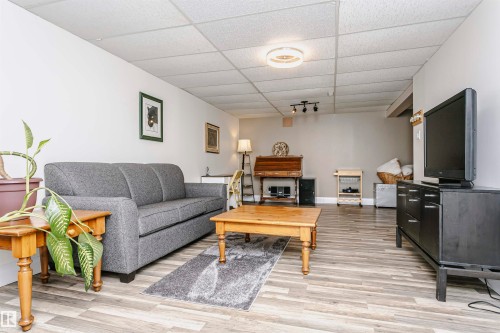 33 Sunnyside Crescent, St. Albert, AB - Indoor Photo Showing Living Room With Fireplace