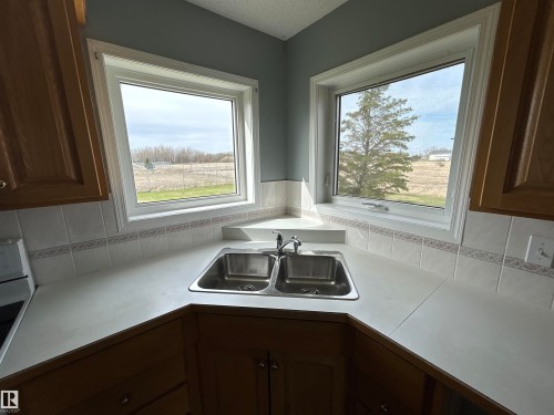 4420 50 Street, Rural Lamont County, AB - Indoor Photo Showing Kitchen With Double Sink