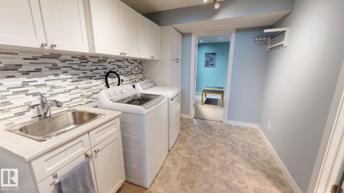 3839 24 Street, Edmonton, AB - Indoor Photo Showing Laundry Room