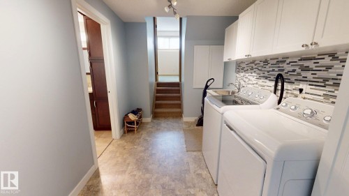 3839 24 Street, Edmonton, AB - Indoor Photo Showing Laundry Room