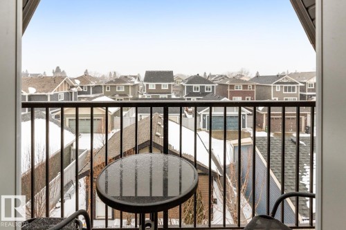 3rd Floor West Facing Juliet Balcony overlooking Manicured Backyard - 7432 Colonel Mewburn Road, Edmonton, AB - Outdoor With Balcony