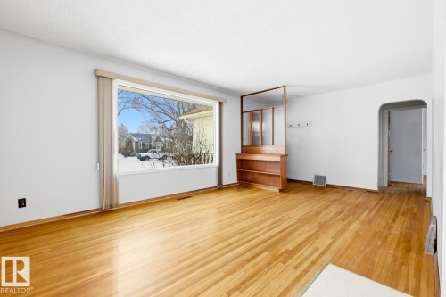 9039 90 Street, Edmonton, AB - Indoor Photo Showing Living Room